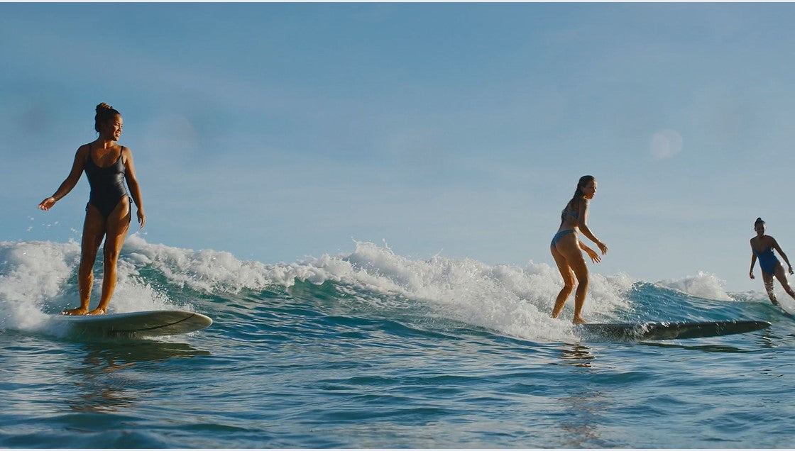 Load video: Women surfing in Hawaii